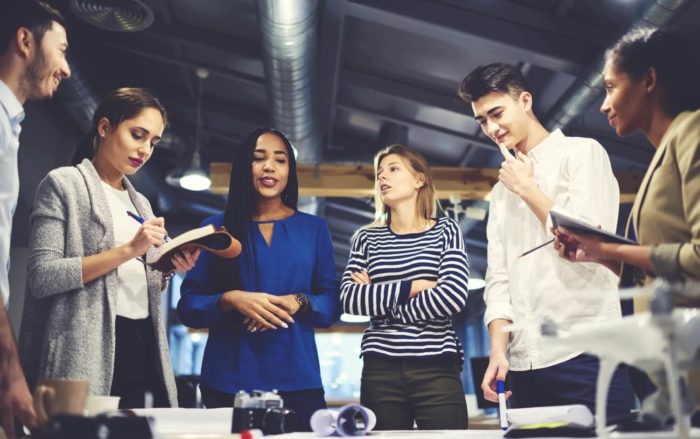 members of a workplace involved in a diversity training session 